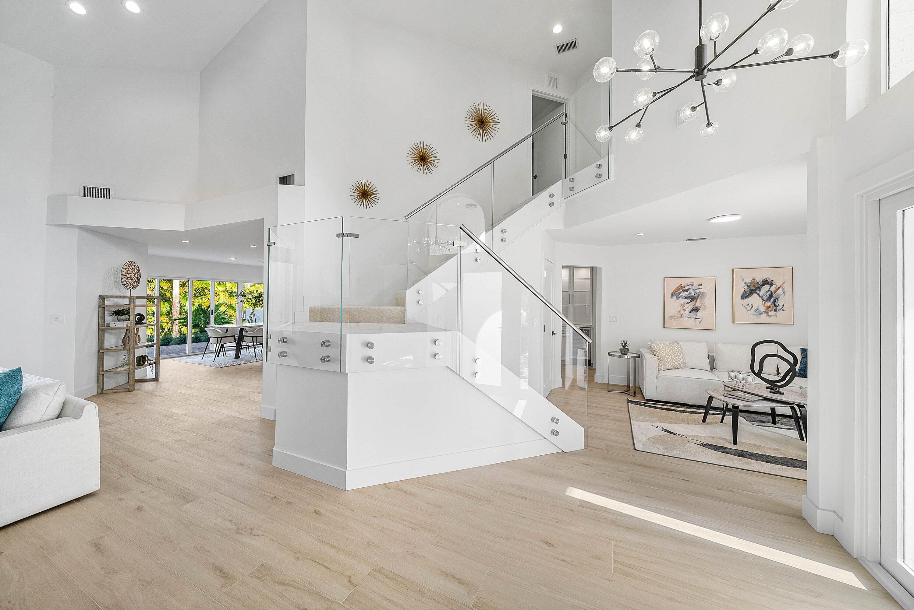 5174 Windsor Parke Drive Boca Raton, FL 33496 - Photo 14 of 55 a view of entryway and hall with wooden floor
