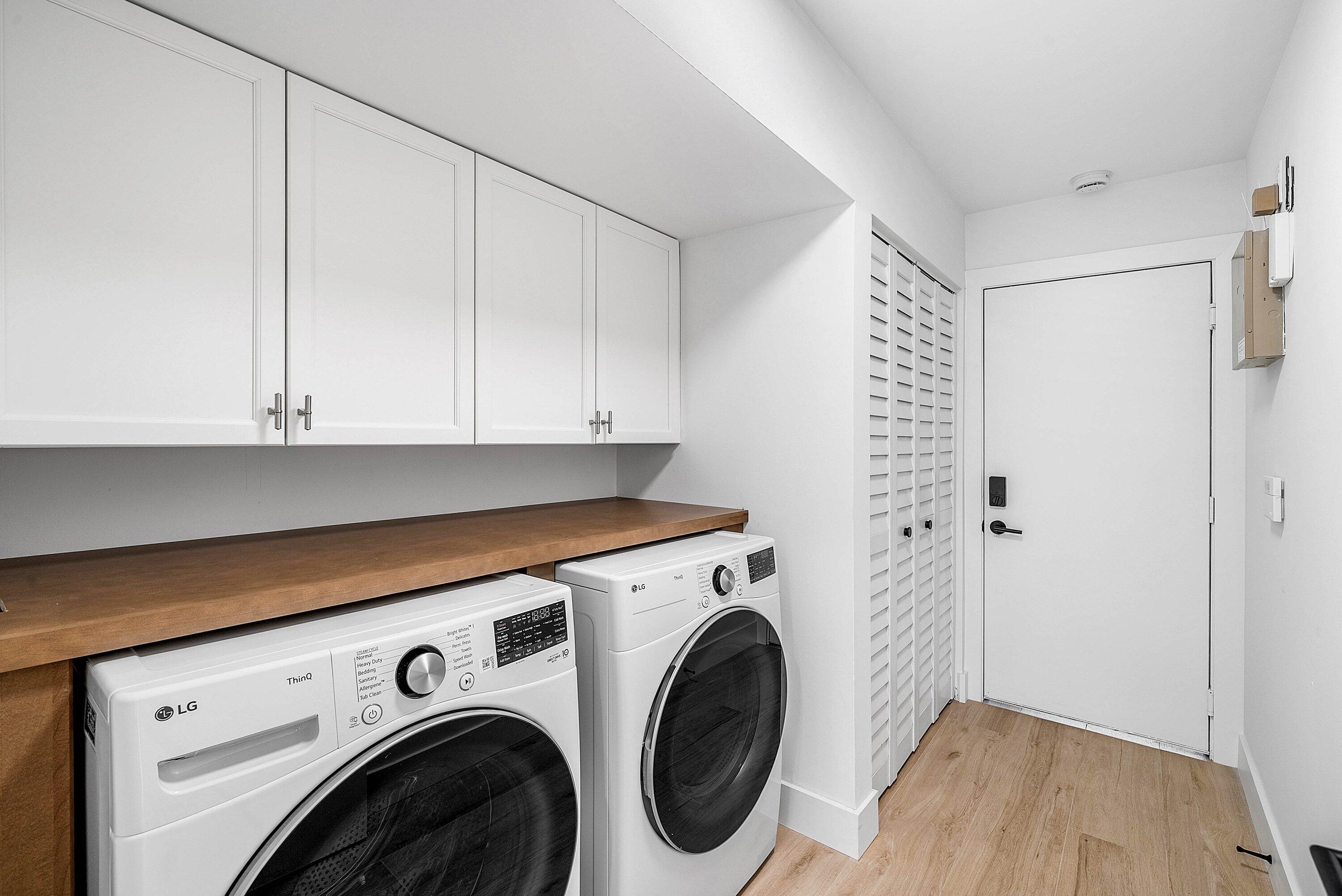 5174 Windsor Parke Drive Boca Raton, FL 33496 - Photo 29 of 55 a utility room with dryer and washer