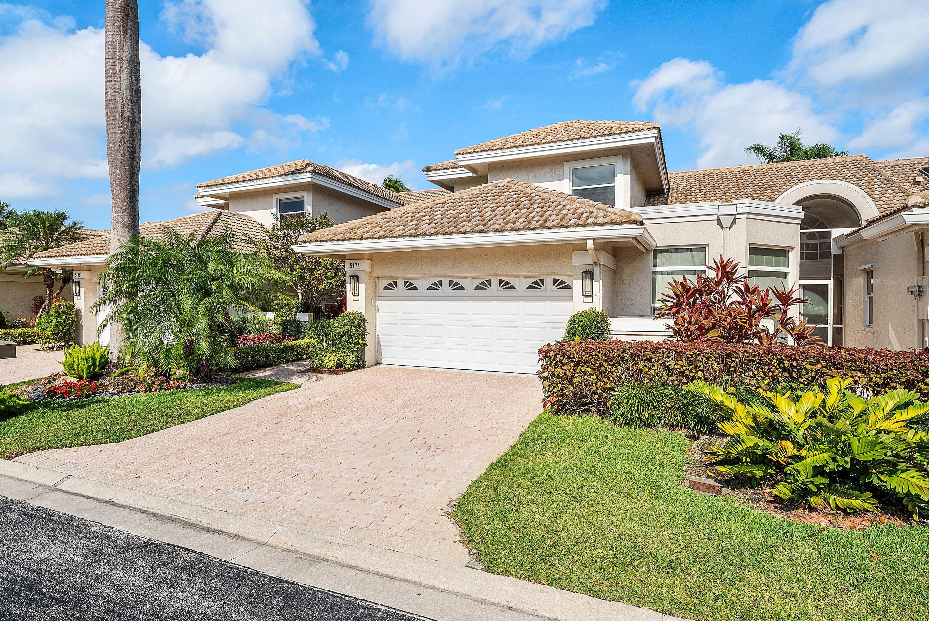 5174 Windsor Parke Drive Boca Raton, FL 33496 - Photo 35 of 55 a front view of house with yard