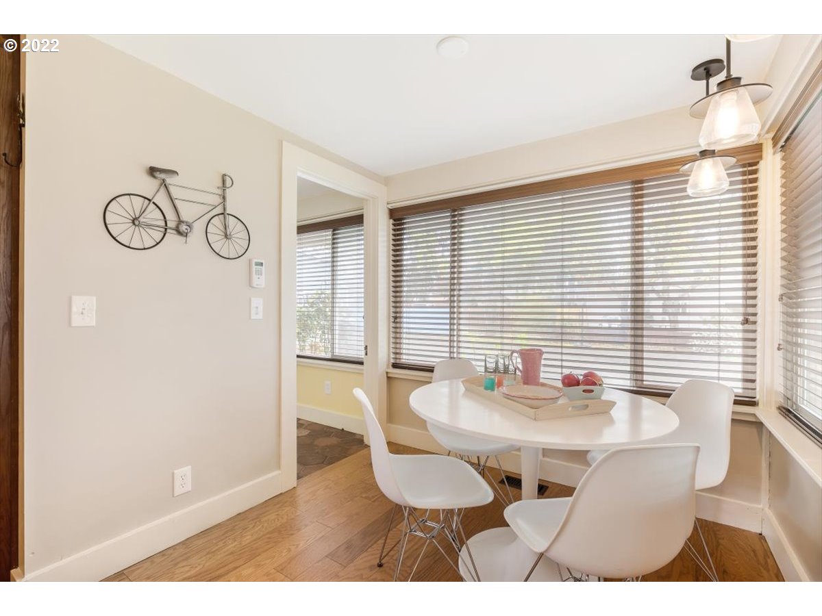 123 Shirley Street Molalla, OR 97038 - Photo 14 of 32 a view of a dining room with furniture and wooden floor