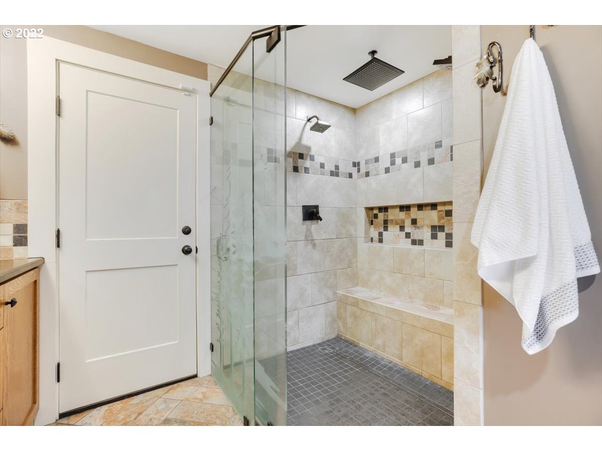 123 Shirley Street Molalla, OR 97038 - Photo 21 of 32 a bathroom with a bathtub and a shower