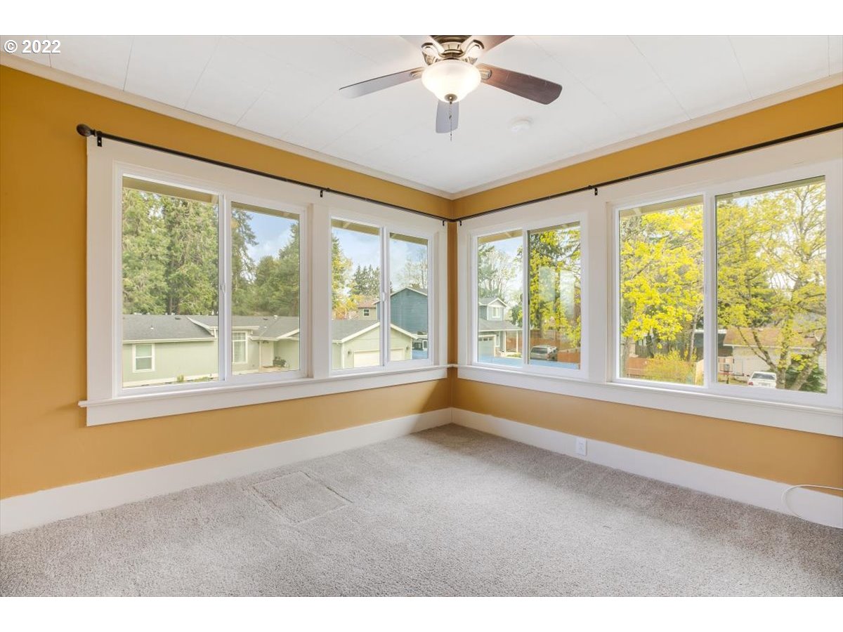 123 Shirley Street Molalla, OR 97038 - Photo 27 of 32 a view of empty room with wooden floor and fan