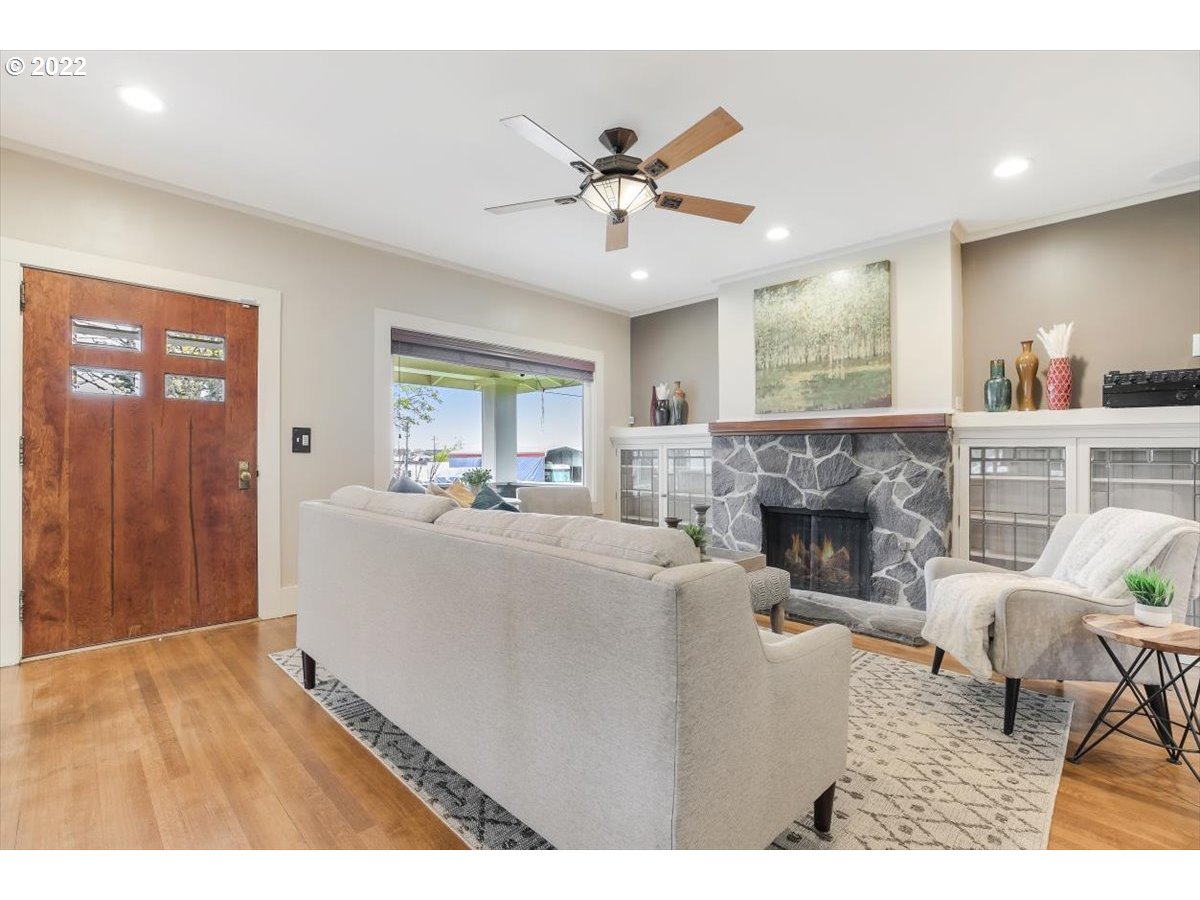 123 Shirley Street Molalla, OR 97038 - Photo 5 of 32 a living room with furniture and a fireplace