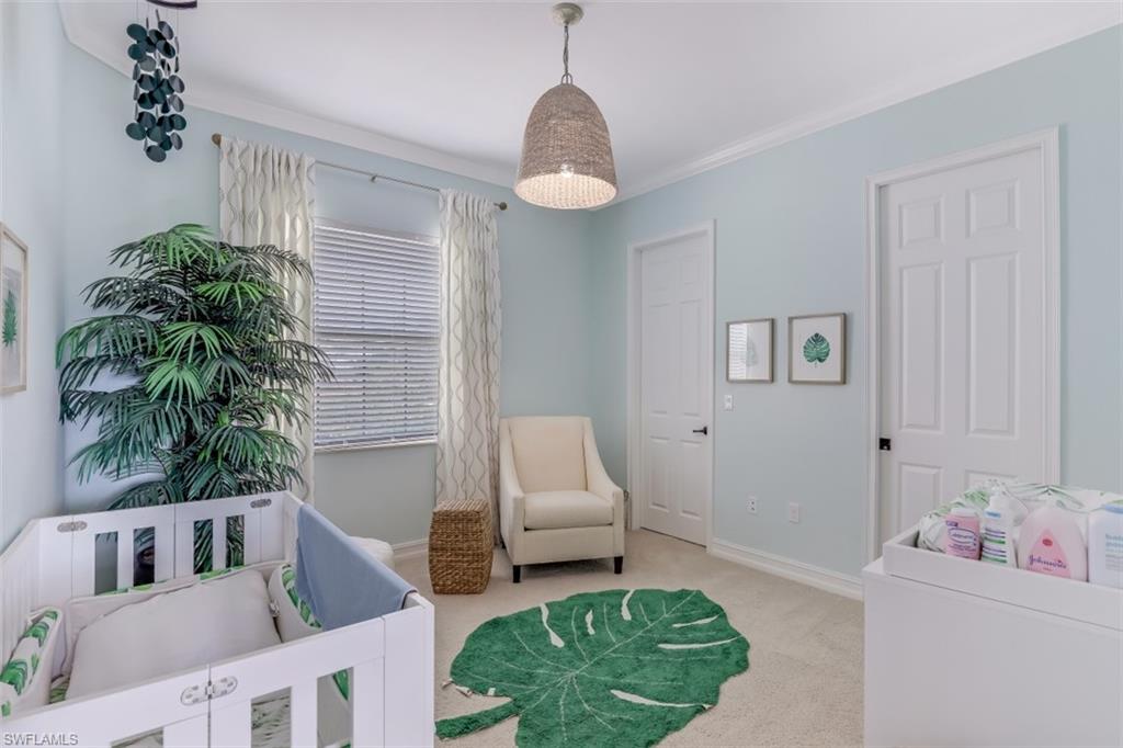 3289 Runaway Lane Naples, FL 34114 - Photo 24 of 35 a living room with furniture and a potted plant