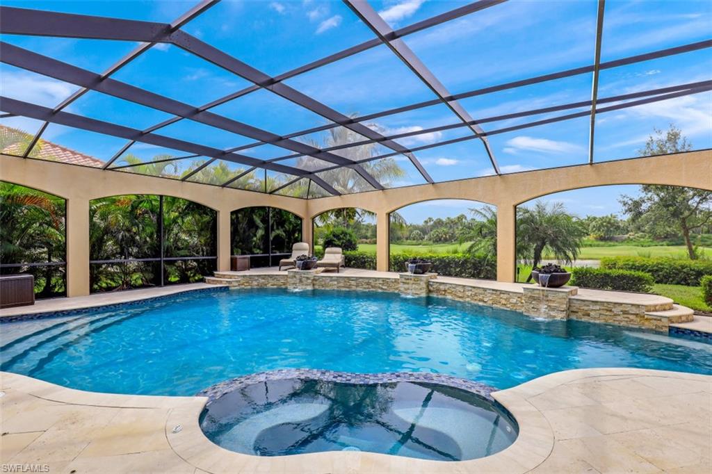 3289 Runaway Lane Naples, FL 34114 - Photo 3 of 35 a view of a swimming pool with a patio