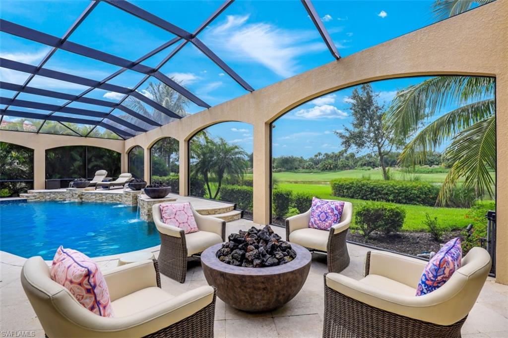 3289 Runaway Lane Naples, FL 34114 - Photo 4 of 35 a outdoor living space with patio furniture and garden view