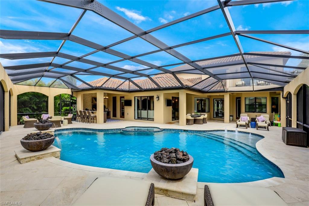 3289 Runaway Lane Naples, FL 34114 - Photo 5 of 35 a view of a kitchen with swimming pool table and chairs