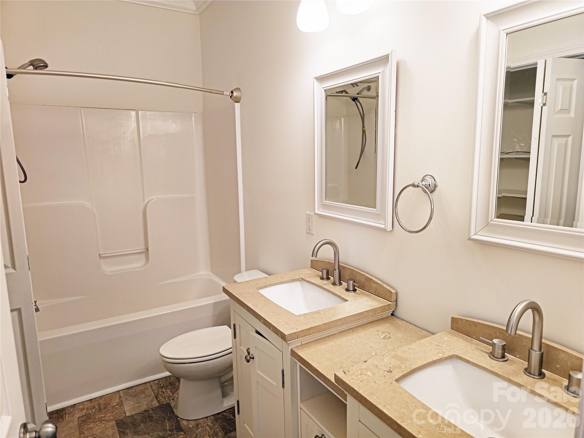 4607 Nesbit Road Monroe, NC 28112 - Photo 21 of 30 a bathroom with a granite countertop sink toilet and shower