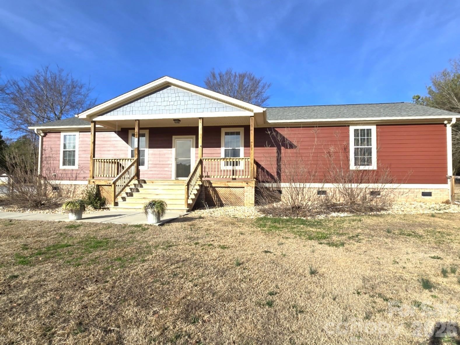 4607 Nesbit Road Monroe, NC 28112 - Photo 25 of 30 a front view of a house with a yard
