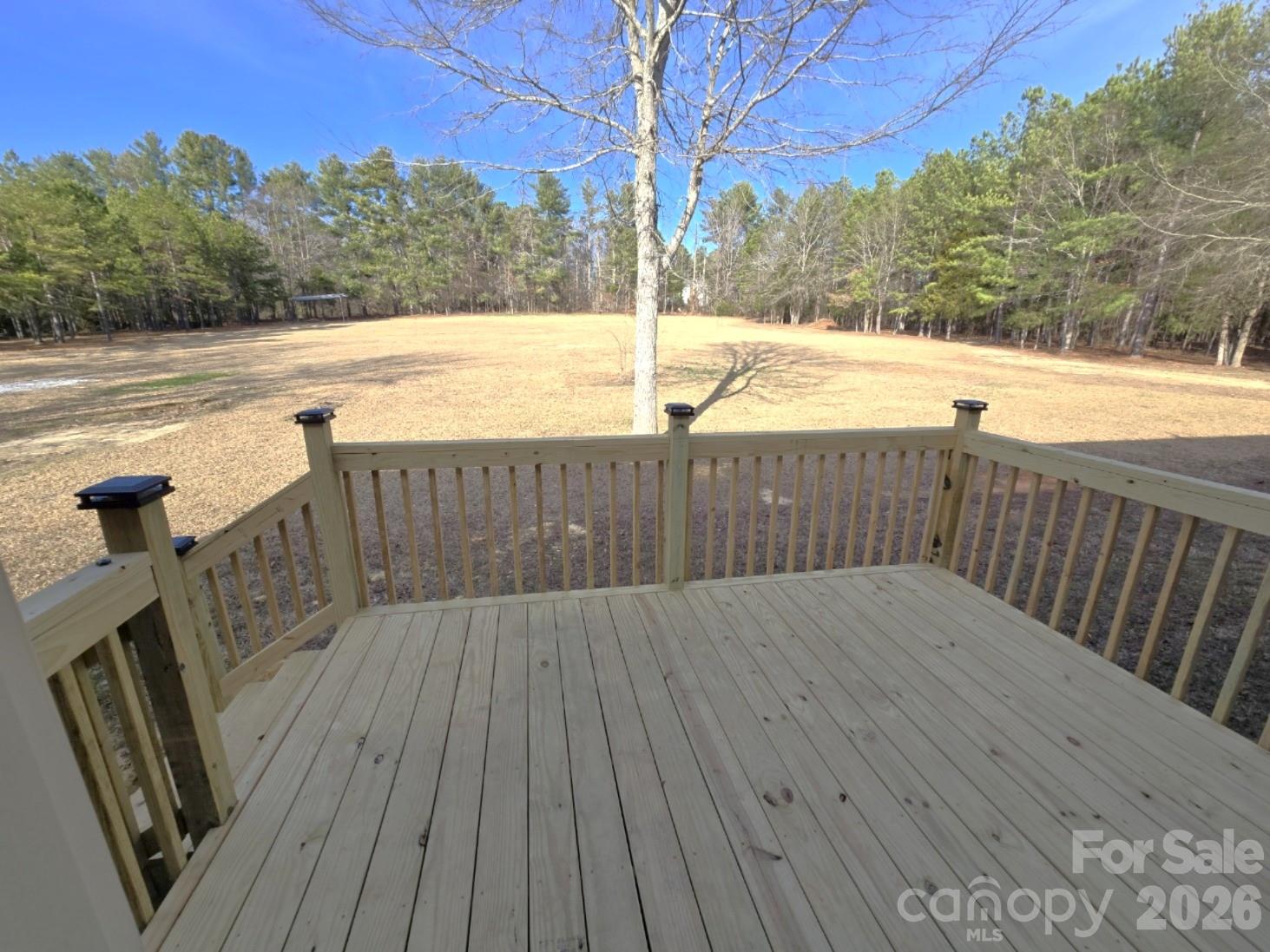 4607 Nesbit Road Monroe, NC 28112 - Photo 29 of 30 a view of deck with yard and wooden fence