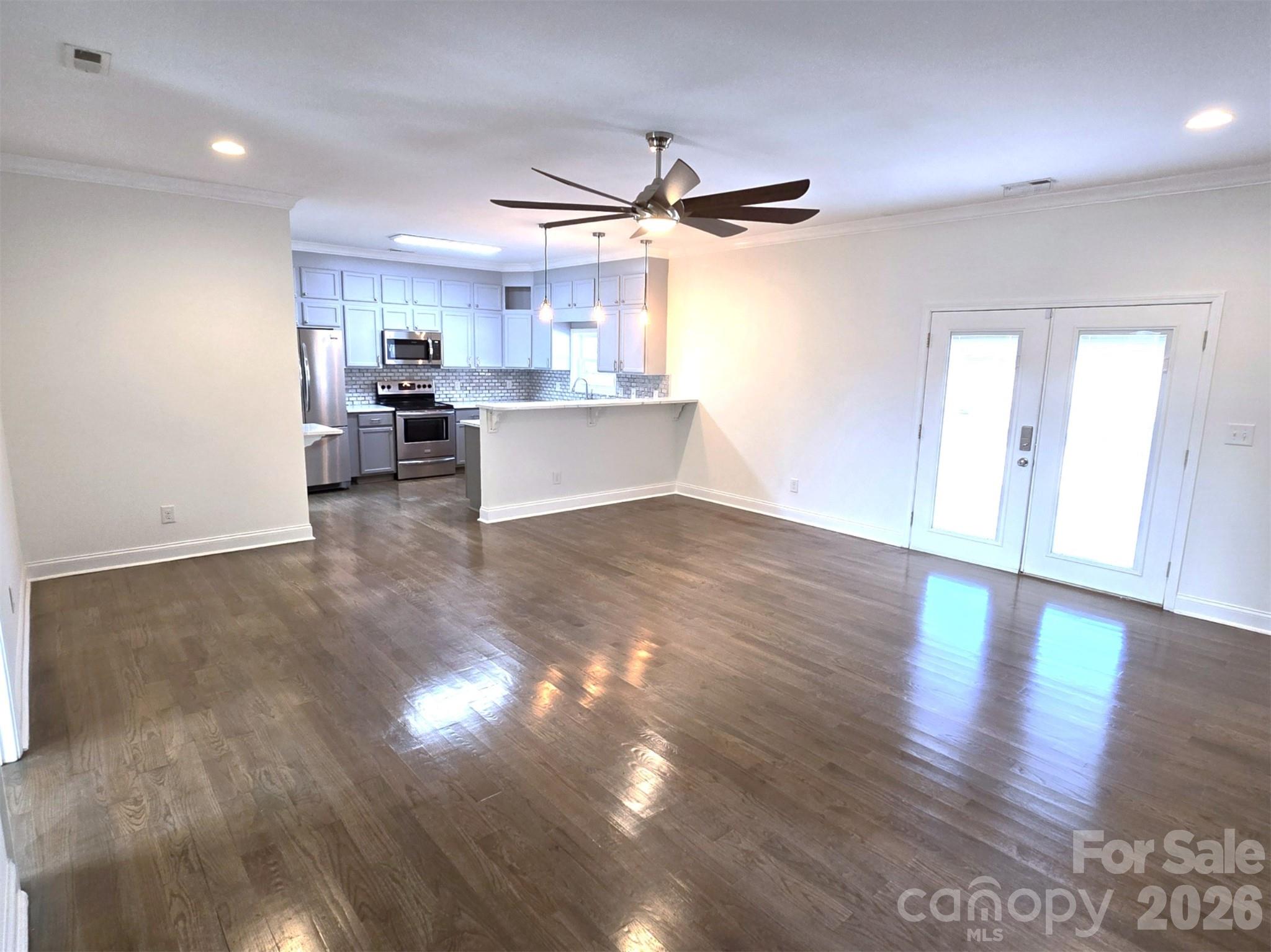 4607 Nesbit Road Monroe, NC 28112 - Photo 3 of 30 a view of a kitchen with wooden floor