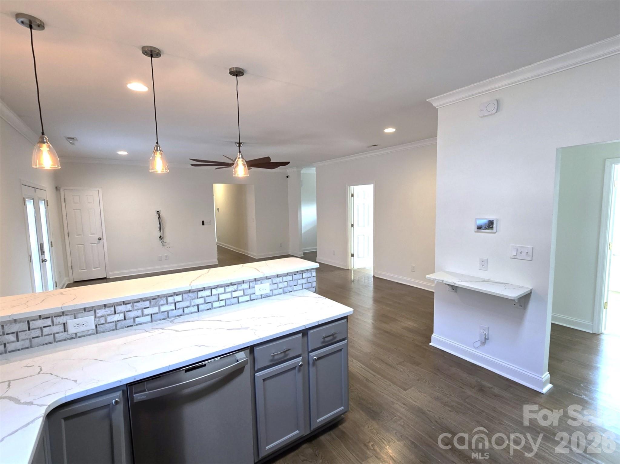 4607 Nesbit Road Monroe, NC 28112 - Photo 4 of 30 a view of a kitchen island a sink and dishwasher
