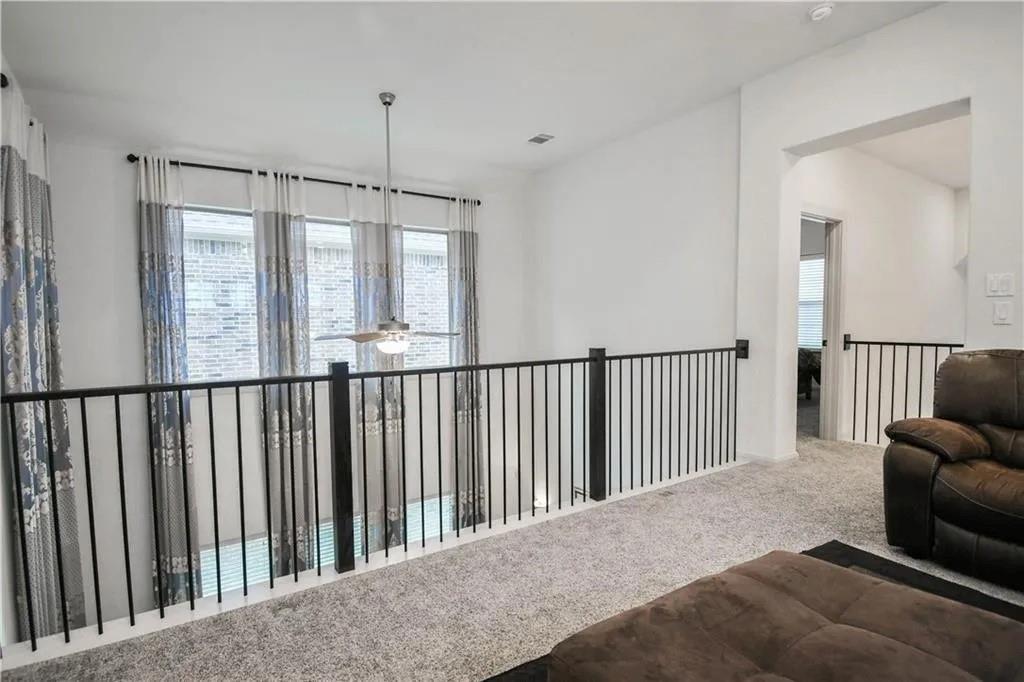 1402 French Violet Way Arlington, TX 76005 - Photo 11 of 29 a view of a balcony