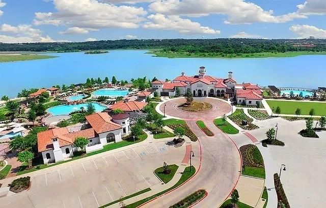 1402 French Violet Way Arlington, TX 76005 - Photo 2 of 29 an aerial view of a house with outdoor space and lake view