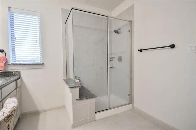 1402 French Violet Way Arlington, TX 76005 - Photo 25 of 29 a bathroom with a shower and a sink