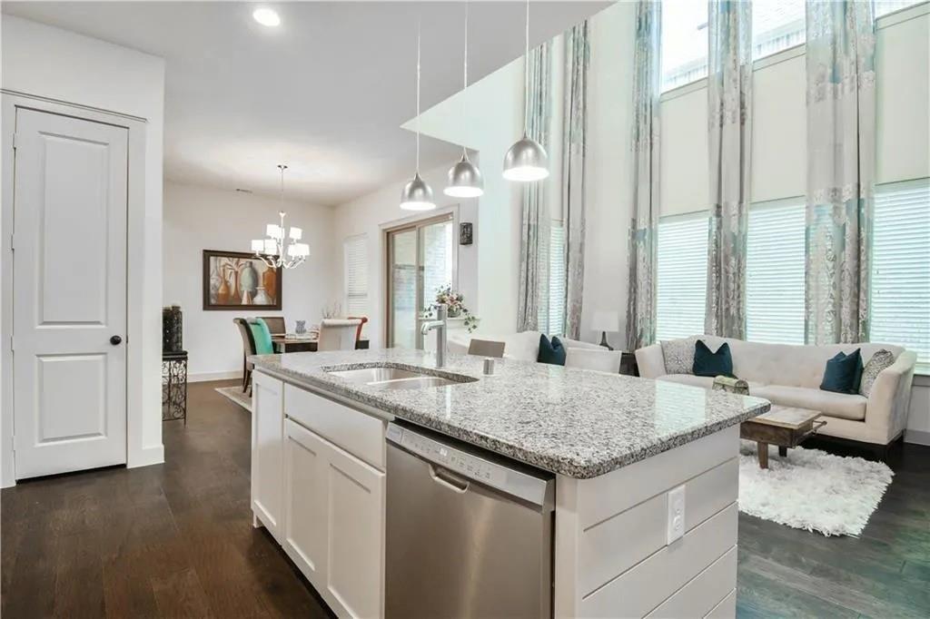 1402 French Violet Way Arlington, TX 76005 - Photo 3 of 29 a view of living room with granite countertop furniture and fireplace