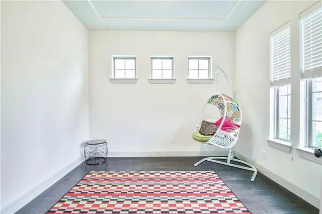 1402 French Violet Way Arlington, TX 76005 - Photo 10 of 29 a room with a rug and a window