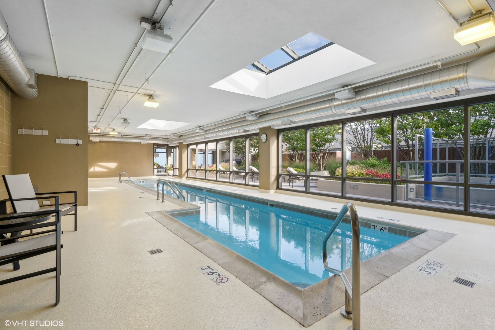 65 East Monroe Street, Unit 4217 Chicago, IL 60603 - Photo 23 of 27 a view of a swimming pool with a large window