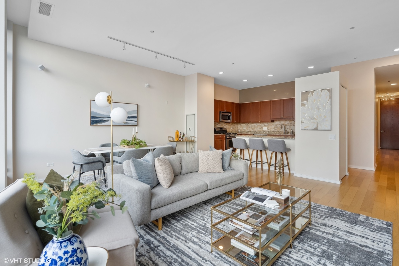 65 East Monroe Street, Unit 4217 Chicago, IL 60603 - Photo 5 of 27 a living room with furniture and a wooden floor