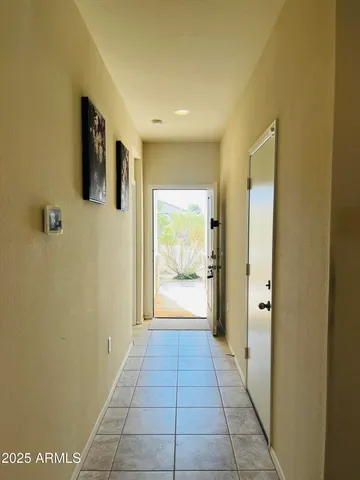 a bathroom with a glass door shower