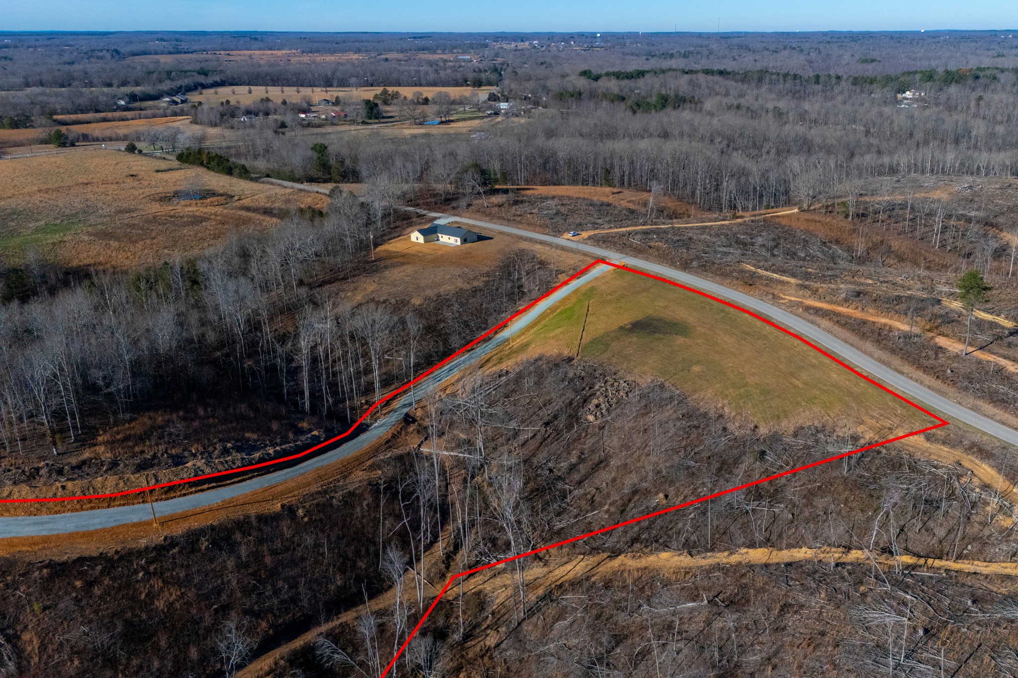 1379 Little Swan Creek Road Hohenwald, TN 38462 - Photo 6 of 14 a view of a backyard