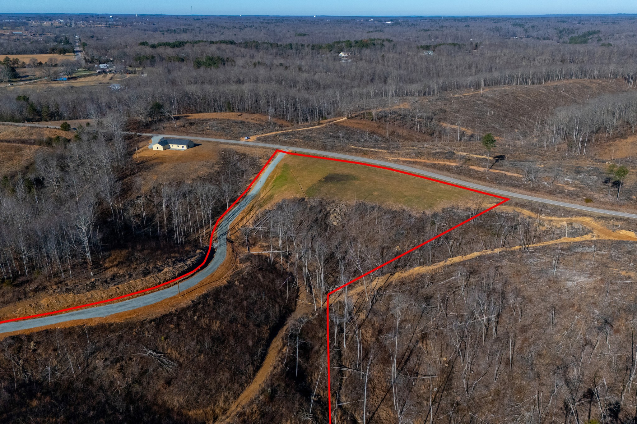 1379 Little Swan Creek Road Hohenwald, TN 38462 - Photo 7 of 14 a view of a backyard