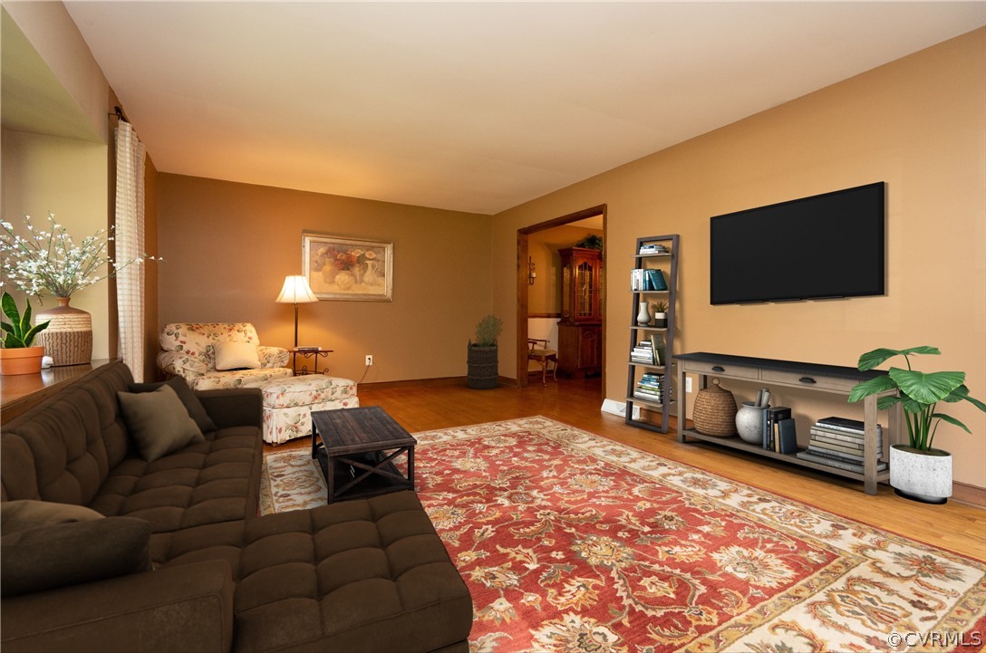 11410 Driscoll Road Chester, VA 23831 - Photo 4 of 24 a living room with furniture and a flat screen tv