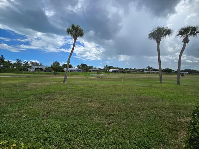 a view of a city with a lake