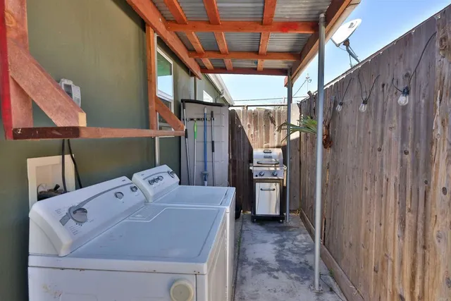 a utility room with dryer and washer