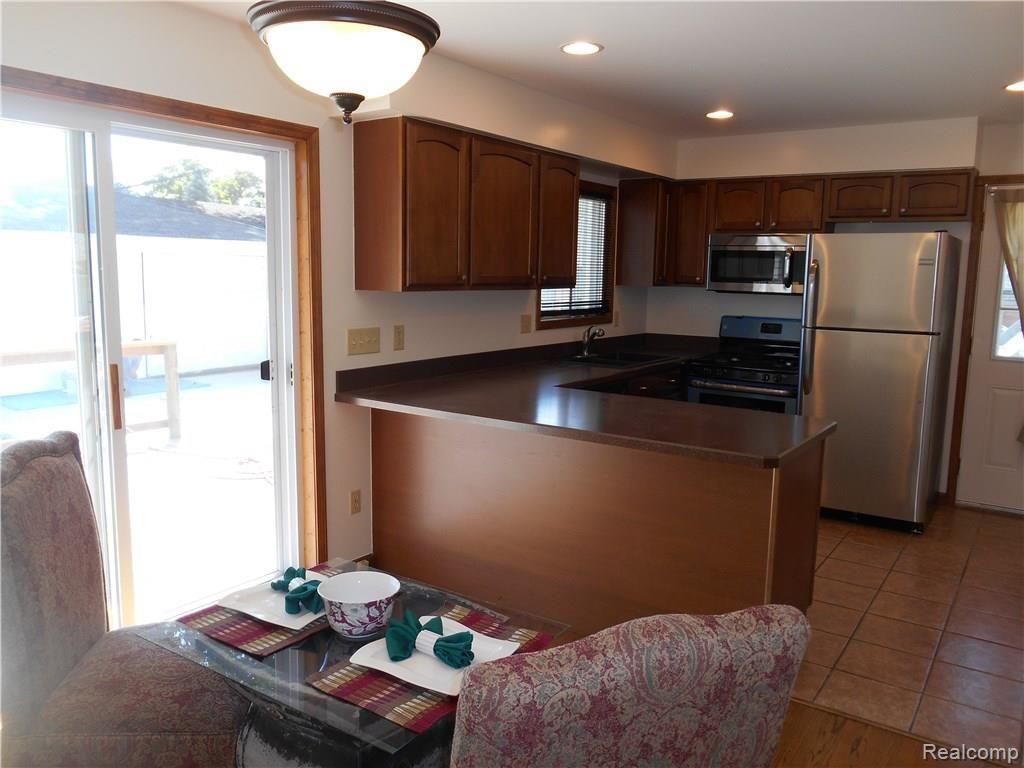 25754 Peter Kaltz Road Warren, MI 48091 - Photo 12 of 68 DINING NOOK INTO KITCHEN VIEW