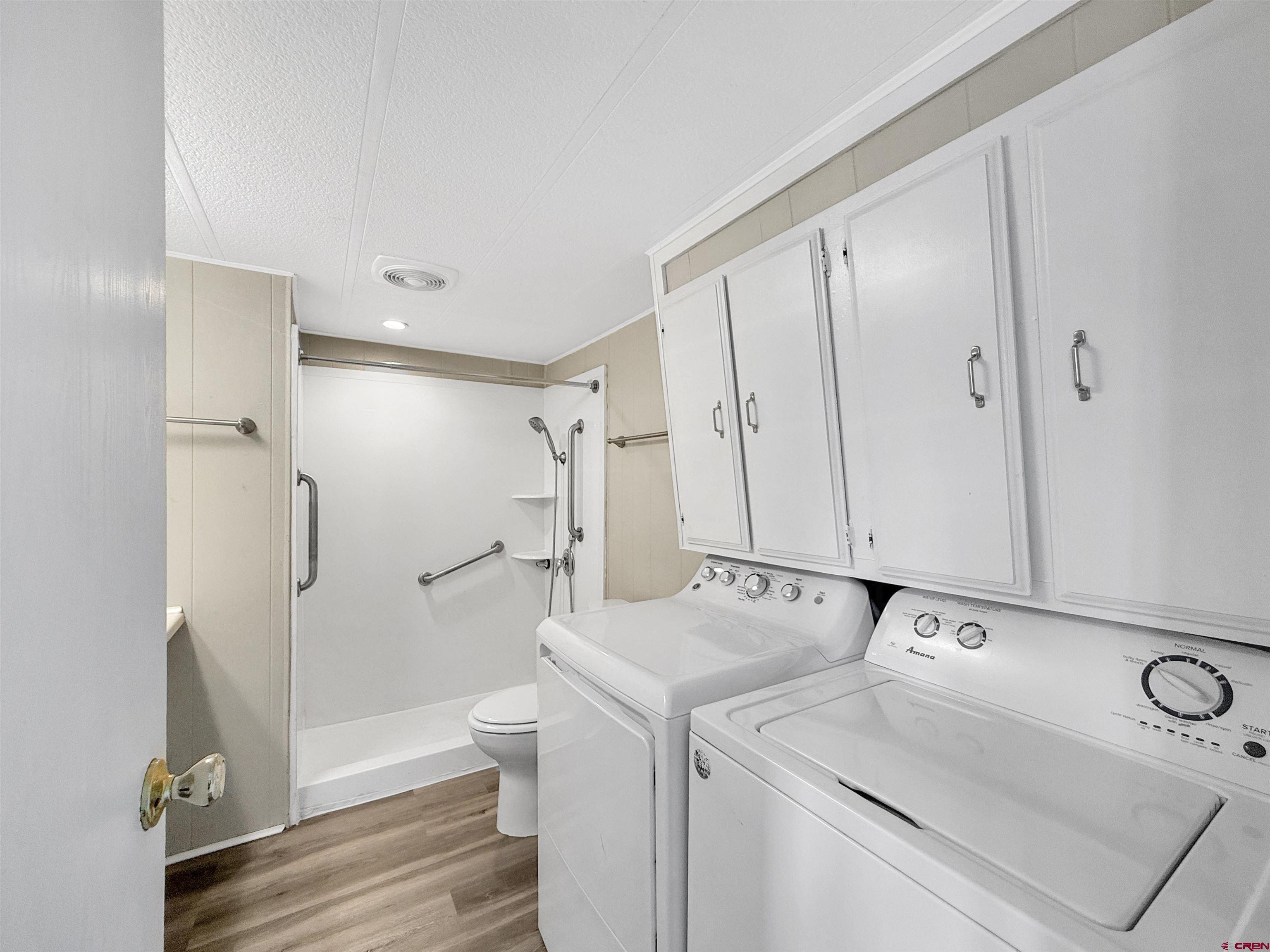 5057 Peach Valley Road Delta, CO 81416 - Photo 16 of 22 a view of bathroom with a sink and mirror