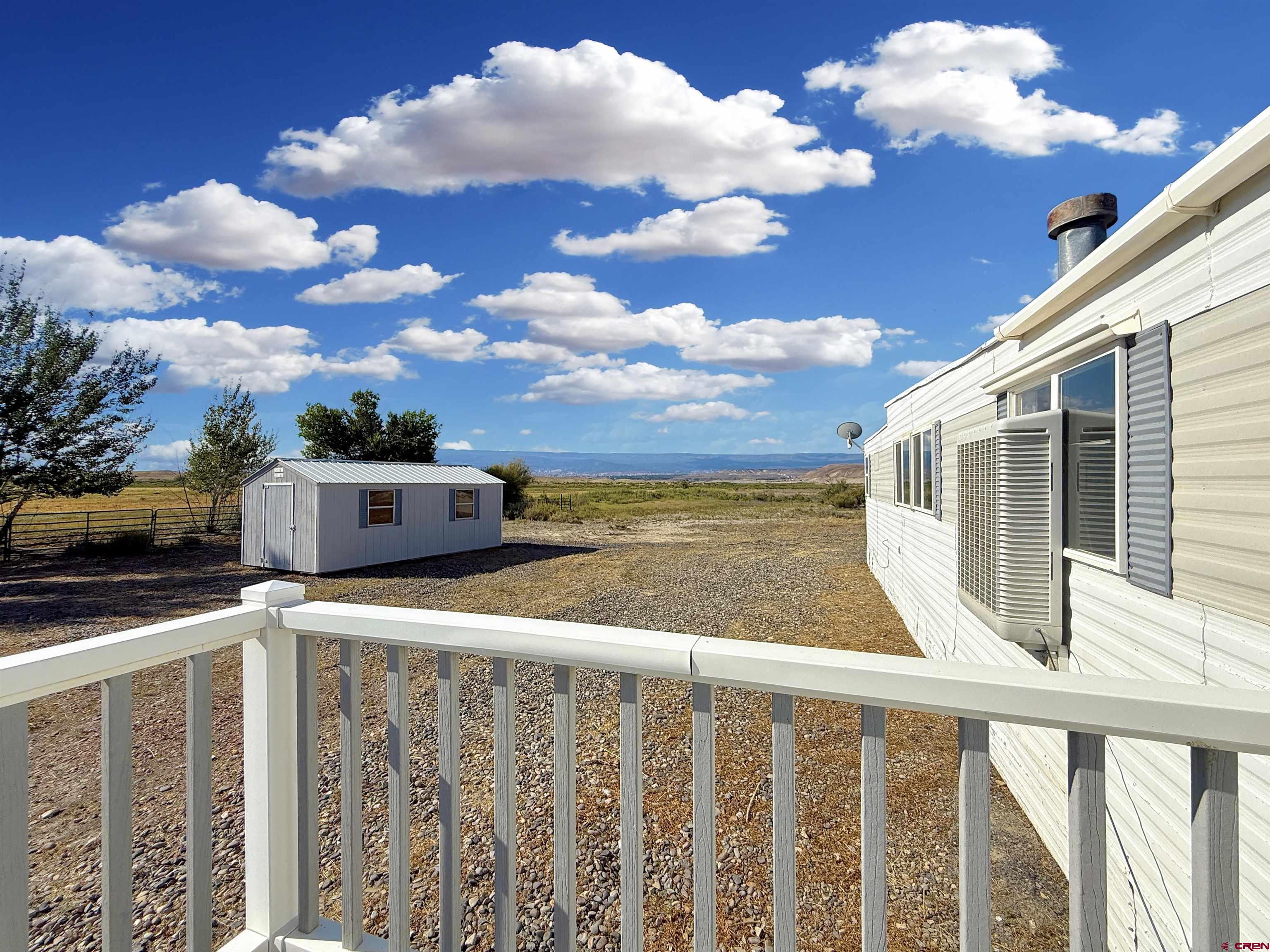 5057 Peach Valley Road Delta, CO 81416 - Photo 5 of 22 a view of building with city view