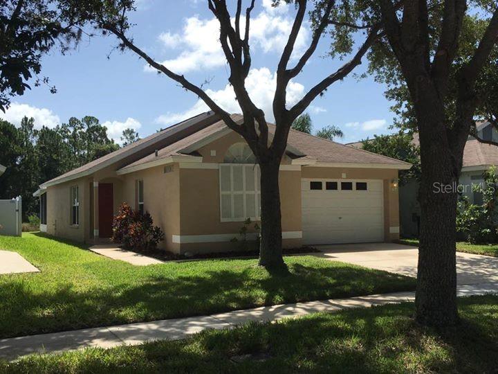5720 Tanagerlake Road Lithia, FL 33547 - Photo 1 of 1 a view of a house with a yard
