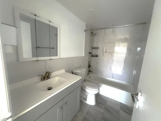 a bathroom with a sink and a toilet