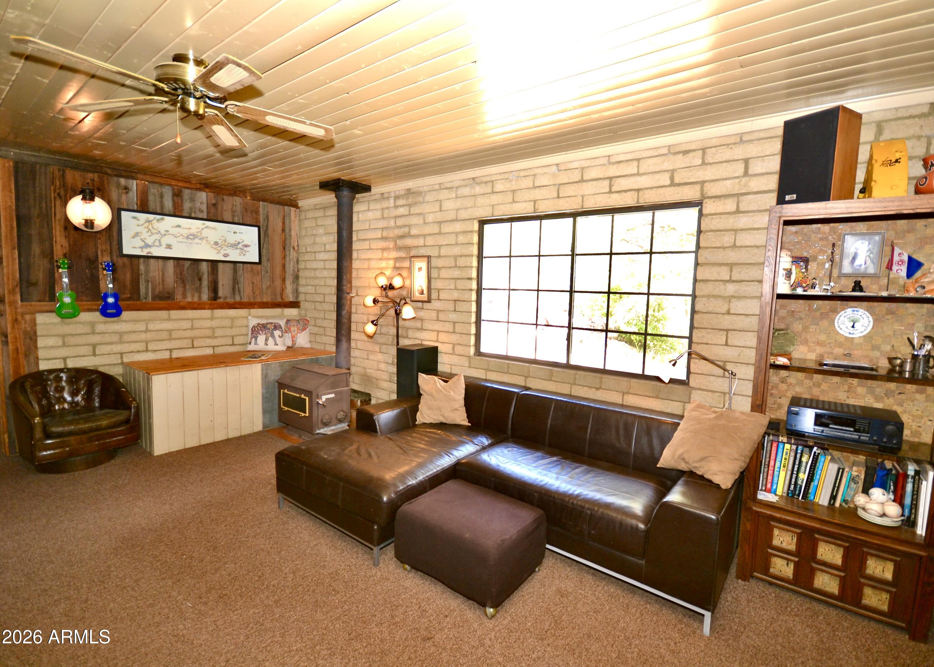 23617 South Demascus Road Crown King, AZ 86343 - Photo 23 of 50 a living room with furniture and a window