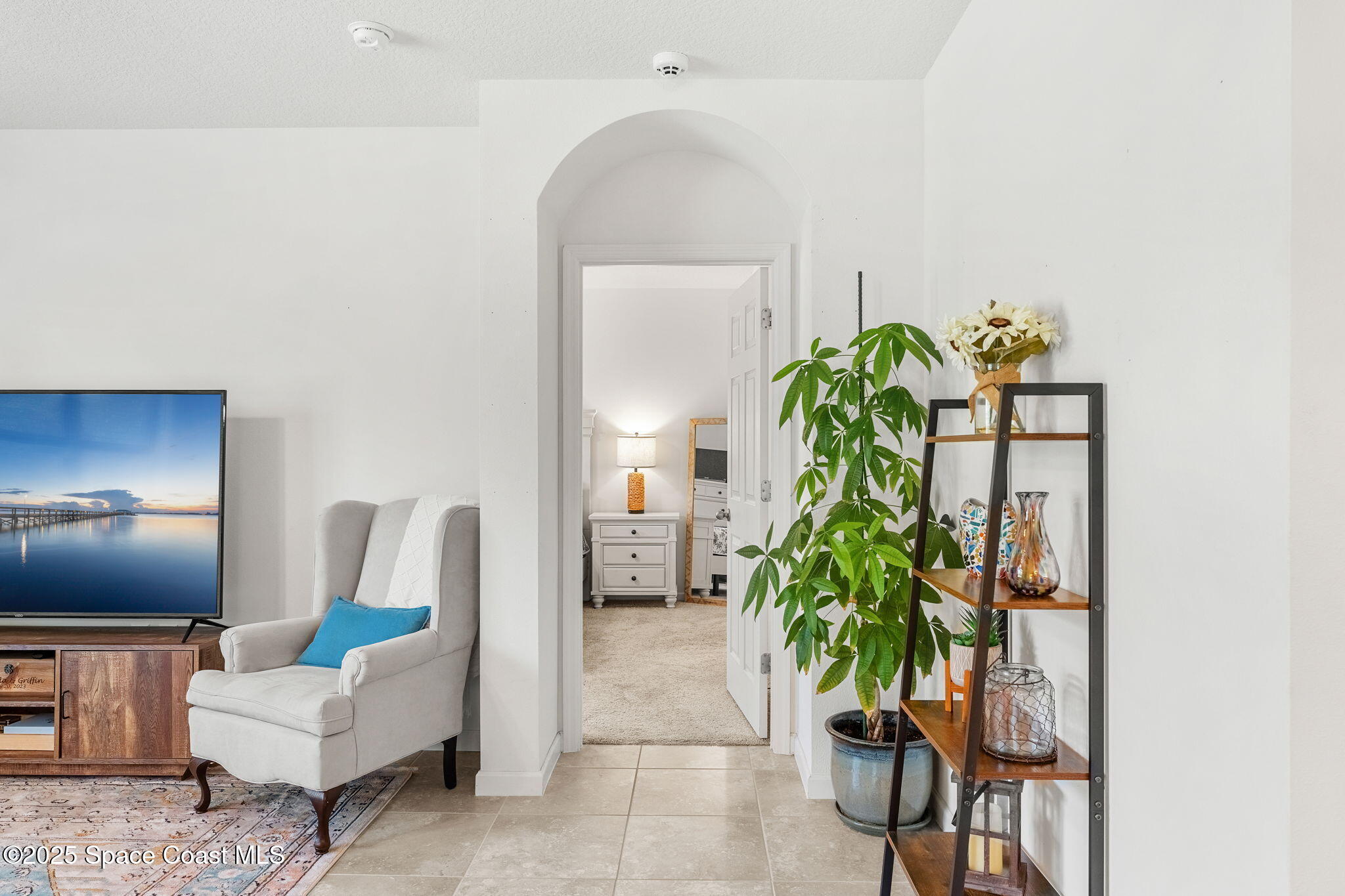 369 Coyote Drive Cocoa, FL 32927 - Photo 12 of 32 Walking toward the primary suite