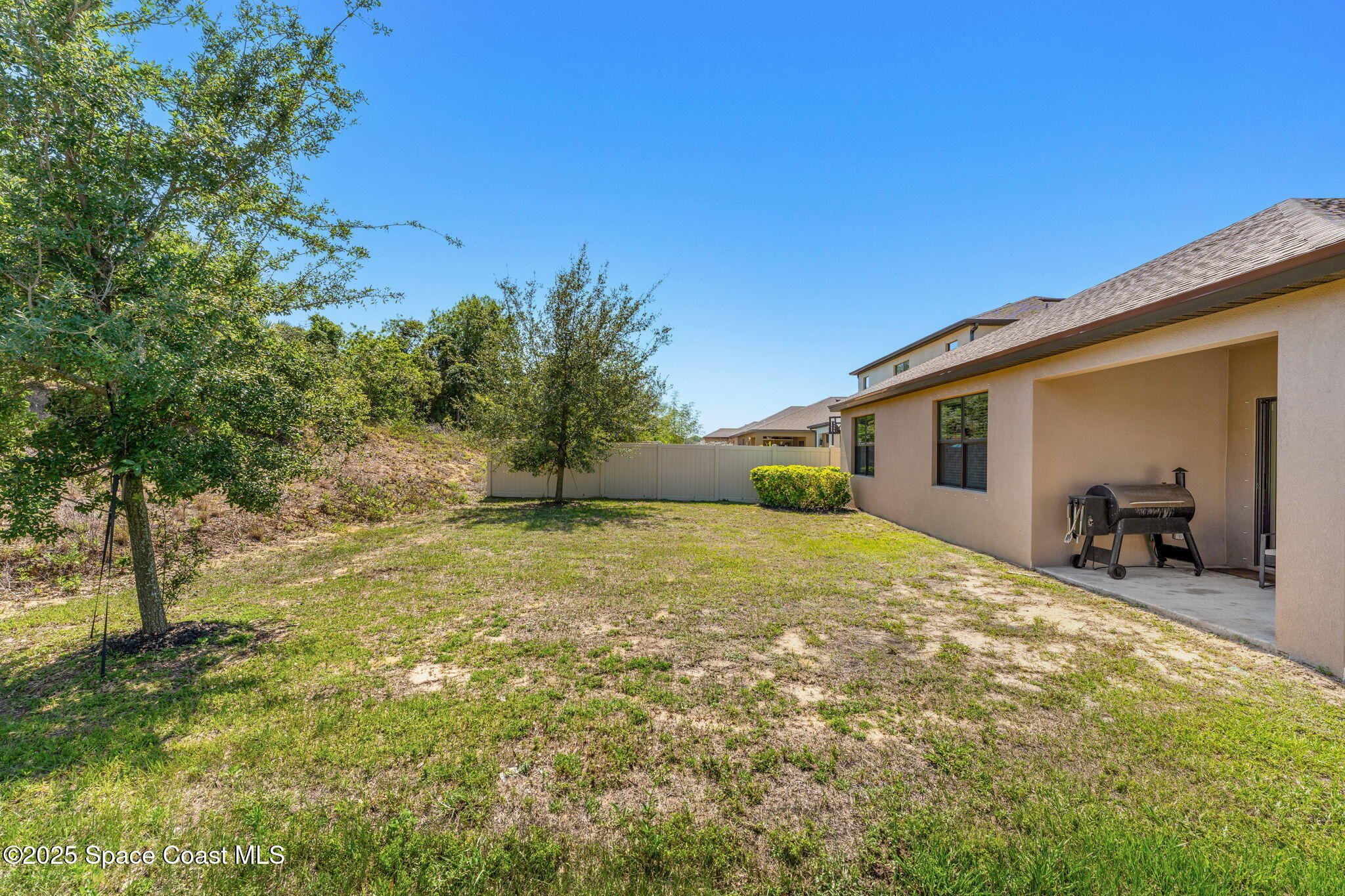 369 Coyote Drive Cocoa, FL 32927 - Photo 22 of 32 Another angle of the backyard