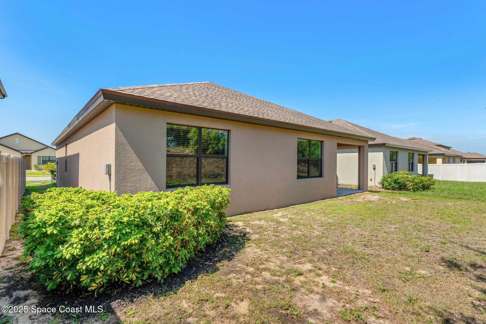 369 Coyote Drive Cocoa, FL 32927 - Photo 23 of 32 Another angle of the backyard