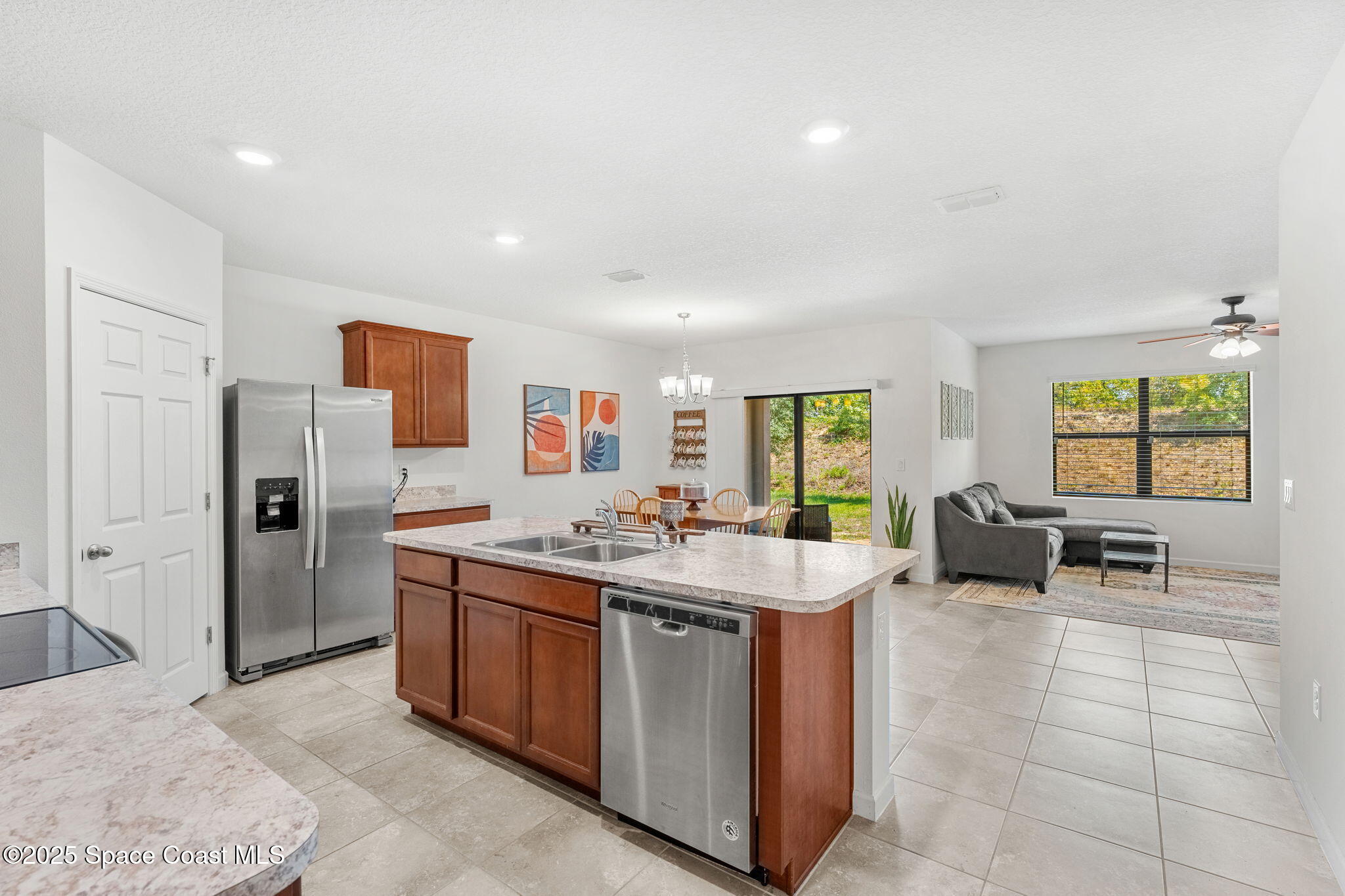369 Coyote Drive Cocoa, FL 32927 - Photo 6 of 32 Walking toward the kitchen