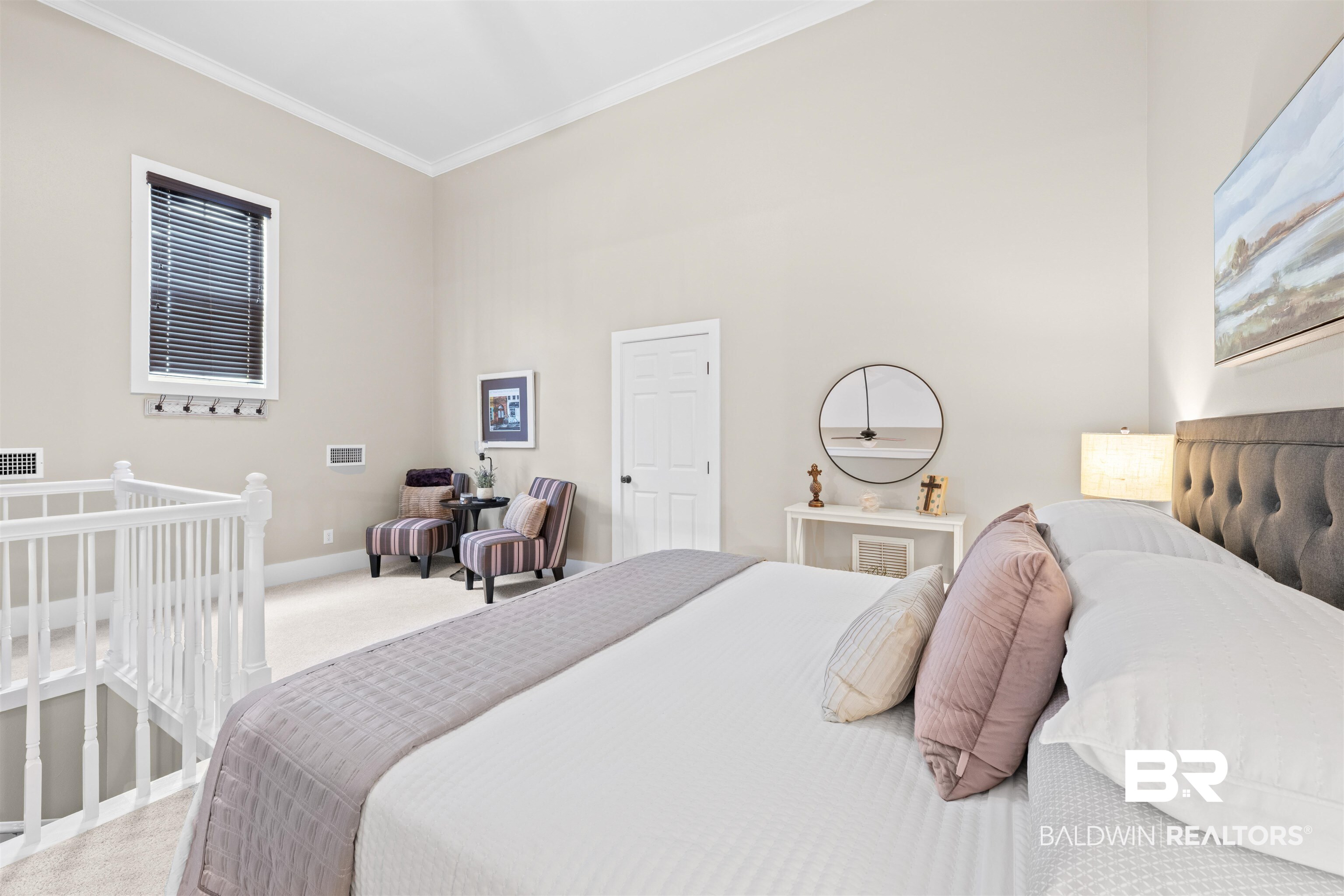 32700 Steelwood Ridge Road, Unit D Loxley, AL 36551 - Photo 22 of 41 Bedroom featuring a high vaulted ceiling, neutral wall tones, and crown molding