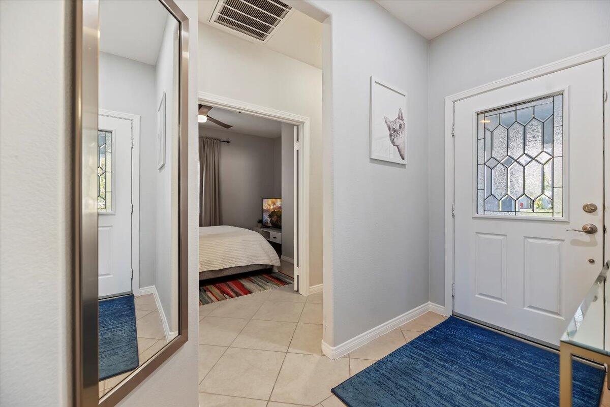 3982 Eastgate N Road Palm Springs, CA 92262 - Photo 15 of 55 a view of a bedroom from a hallway