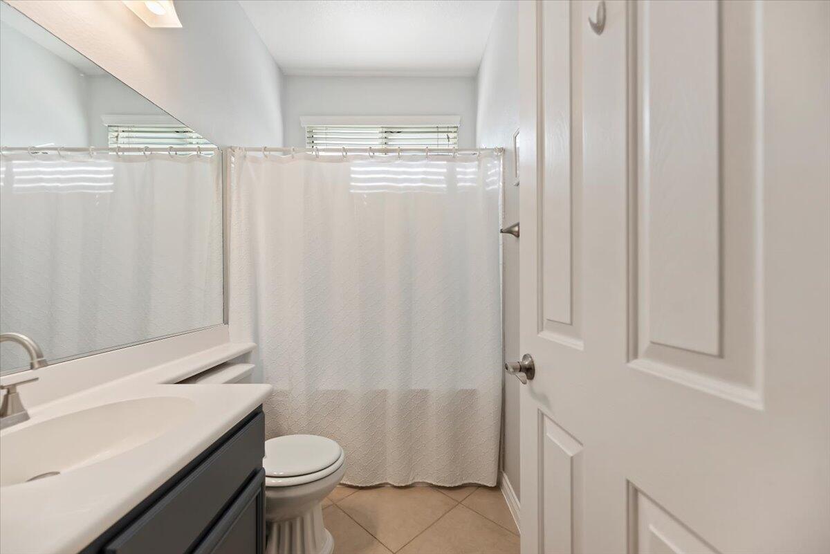 3982 Eastgate N Road Palm Springs, CA 92262 - Photo 19 of 55 a bathroom with a sink toilet and shower