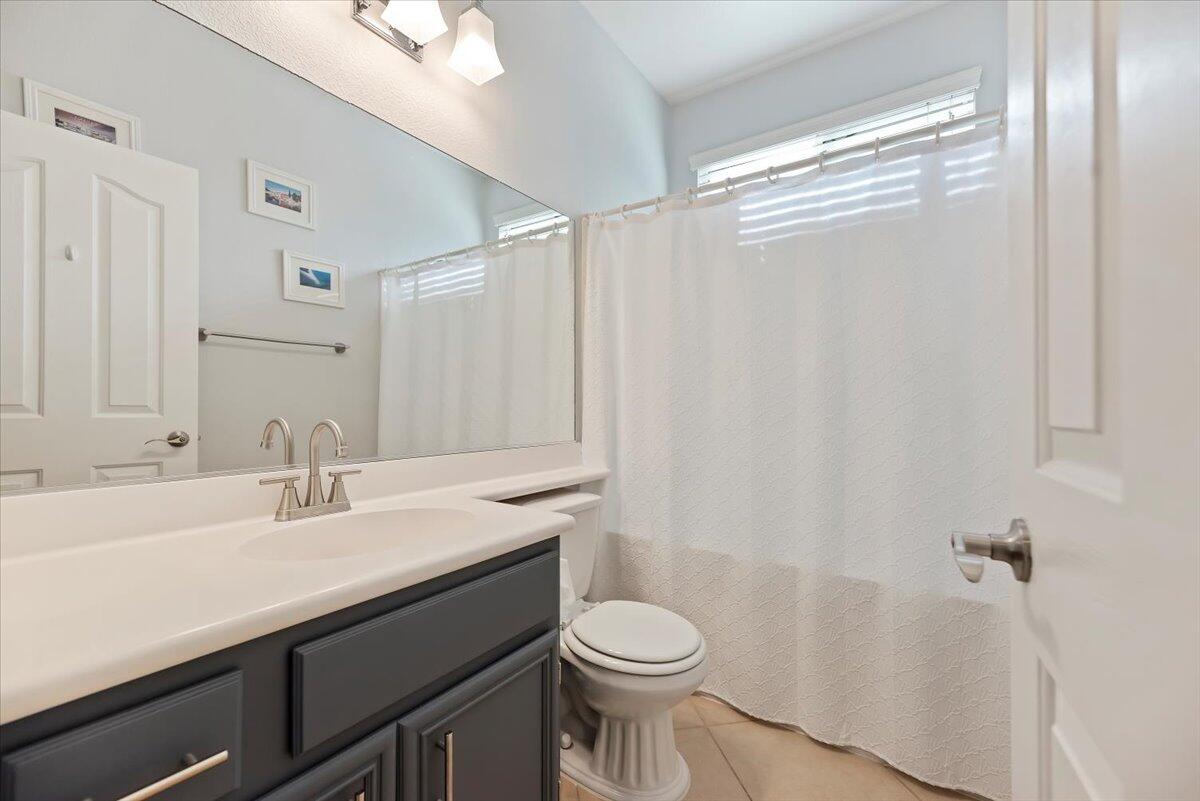 3982 Eastgate N Road Palm Springs, CA 92262 - Photo 20 of 55 a bathroom with a sink a toilet and shower