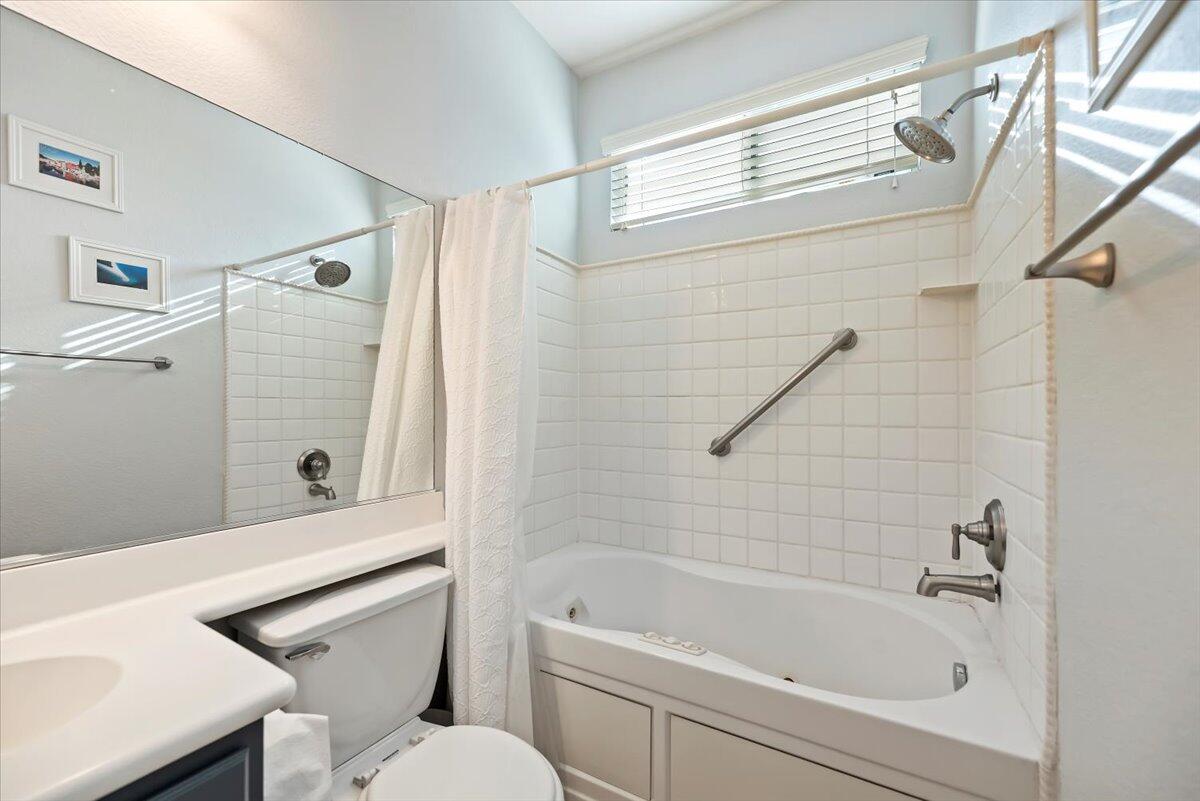 3982 Eastgate N Road Palm Springs, CA 92262 - Photo 26 of 55 a bathroom with a sink a toilet and shower