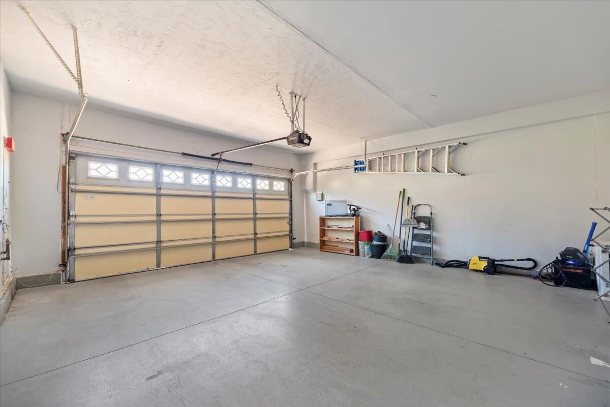3982 Eastgate N Road Palm Springs, CA 92262 - Photo 33 of 55 a view of a garage with storage