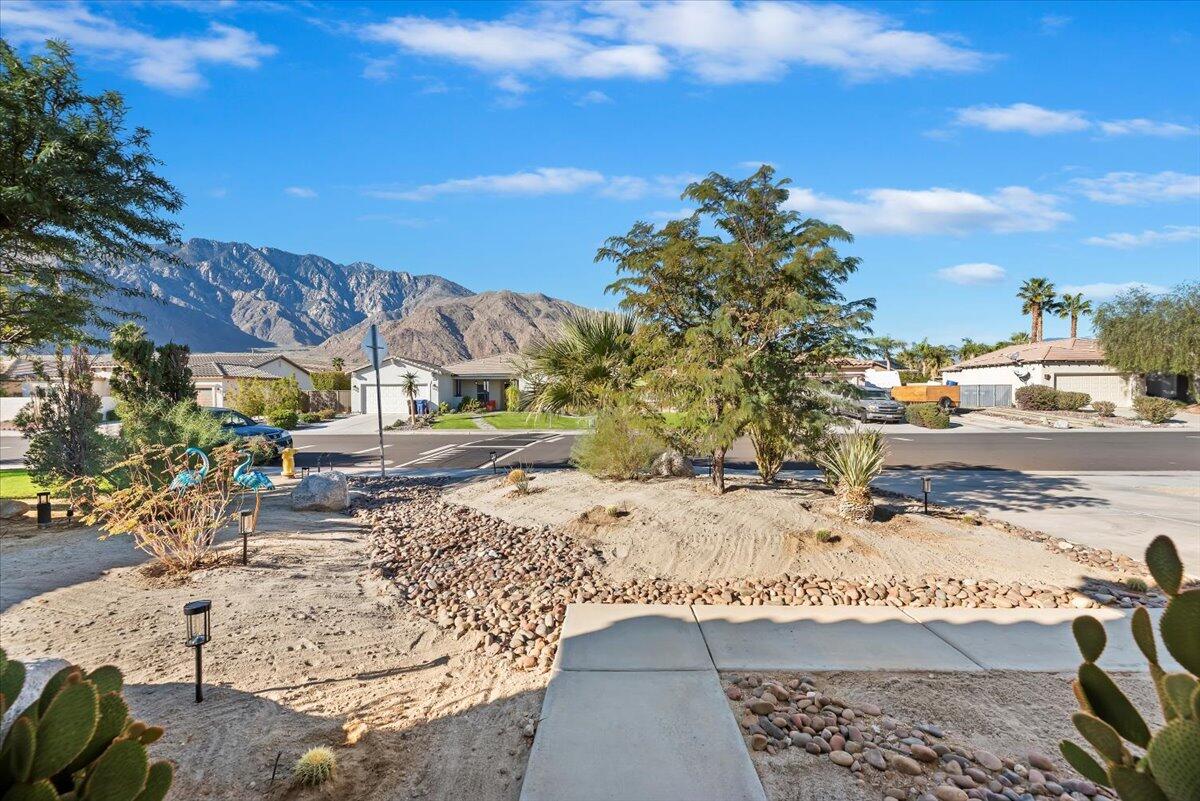 3982 Eastgate N Road Palm Springs, CA 92262 - Photo 39 of 55 a view of a road with a building in the background