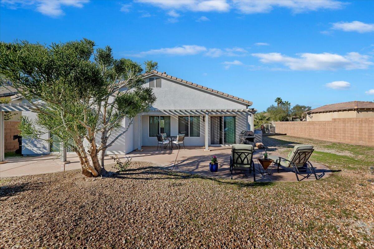 3982 Eastgate N Road Palm Springs, CA 92262 - Photo 43 of 55 a view of a house with backyard and sitting area
