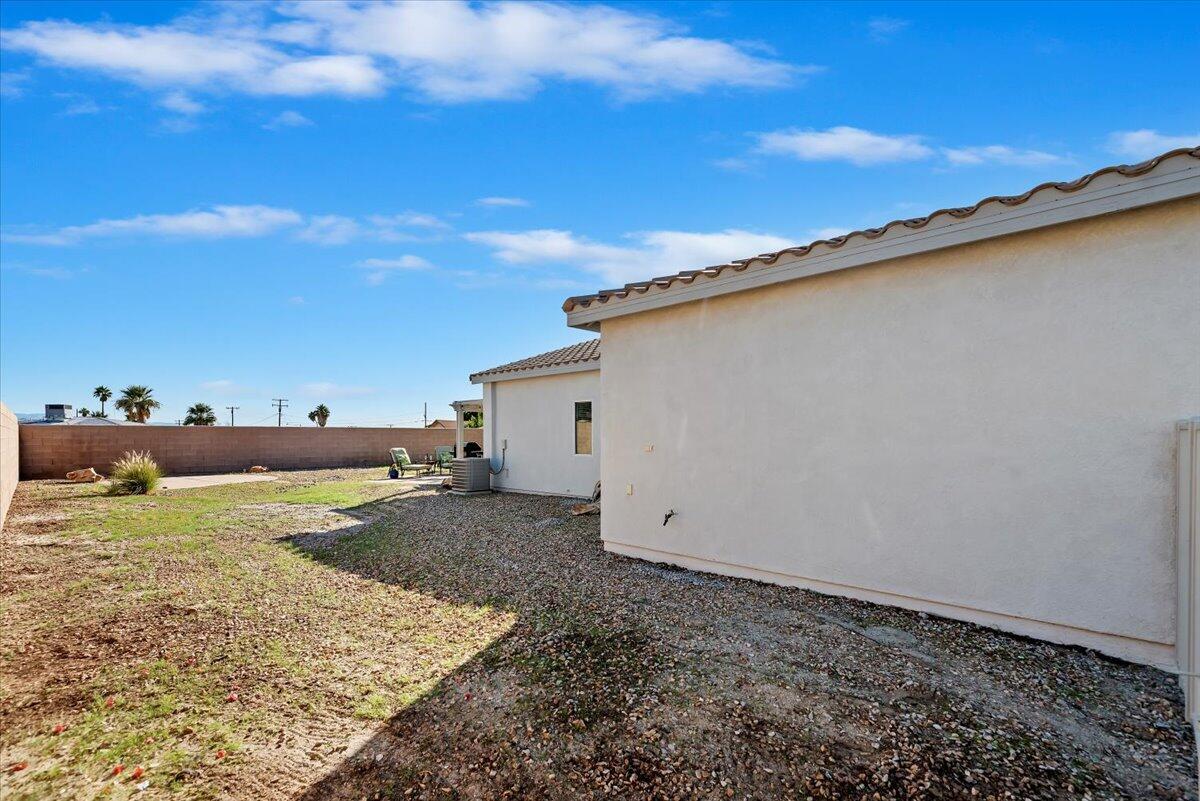 3982 Eastgate N Road Palm Springs, CA 92262 - Photo 53 of 55 a view of a dry yard with wooden fence