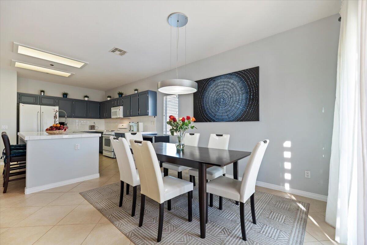 3982 Eastgate N Road Palm Springs, CA 92262 - Photo 7 of 55 a dining room with furniture and window