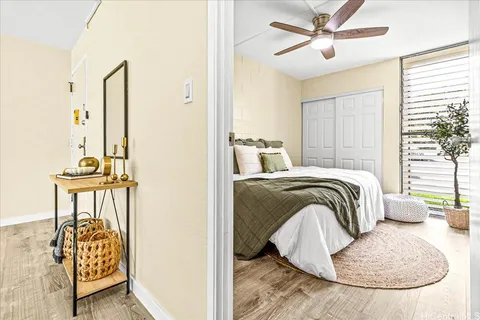 a view of a bedroom with furniture and staircase
